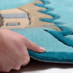 THEKO die markenteppiche Tapis enfant Honolulu - Tissu - Turquoise - 100 x 160 cm 7 THEKO die markenteppiche Tapis enfant Honolulu - Tissu - Turquoise - 100 x 160 cm -Tapis enfant Soldes 1000174697 190715 16133100012 DETAILS P000000001000174697