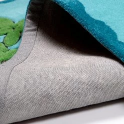 THEKO die markenteppiche Tapis enfant Honolulu - Tissu - Turquoise - 100 x 160 cm 9 THEKO die markenteppiche Tapis enfant Honolulu - Tissu - Turquoise - 100 x 160 cm -Tapis enfant Soldes 1000174697 190715 16133100014 DETAILS P000000001000174697